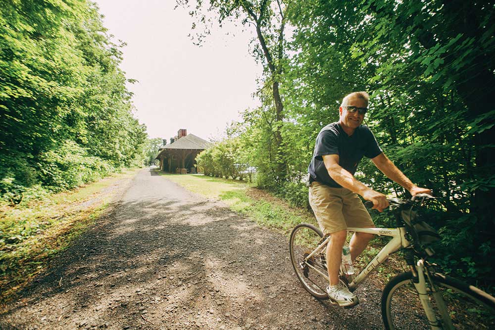 Lloyd-Seeler-from-Kingston-taking-a-bicycle-ride-on-the-rail-trail-in-New-Paltz-2