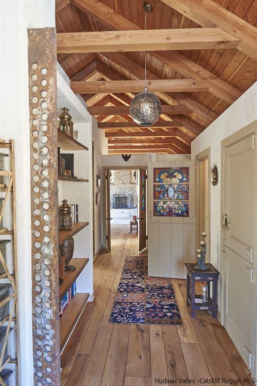 Close-up of antique metalwork in the hallway of this romantic Woodstock home