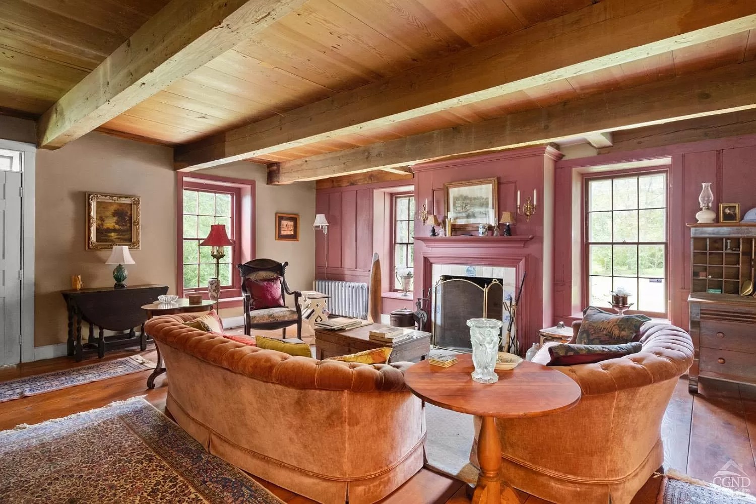 Exposed ceiling beams mark Colonial time of stone house